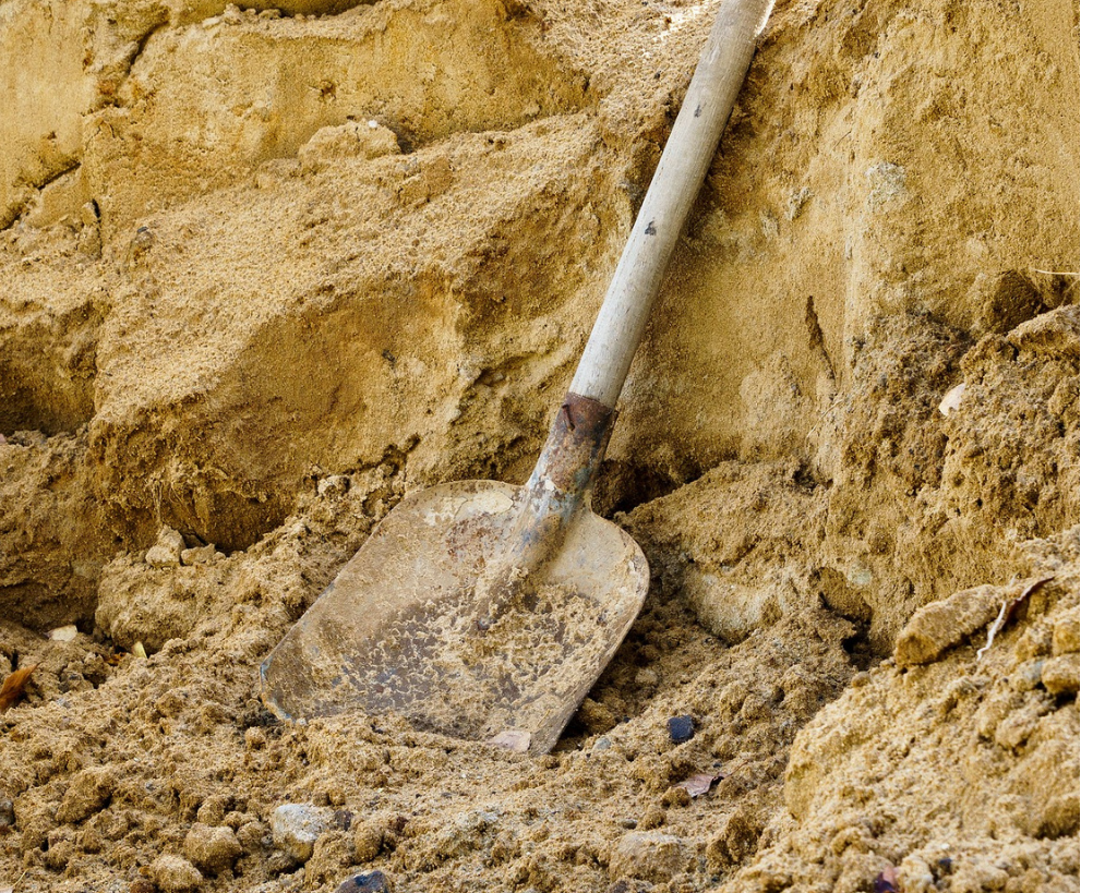 Water beading on hydrophobic sandy soil in Perth garden before treatment .Jurassic Juice potassium humate concentrate for fixing water-repellent soil   Improved water penetration in Perth sandy soil after Jurassic Juice treatment 